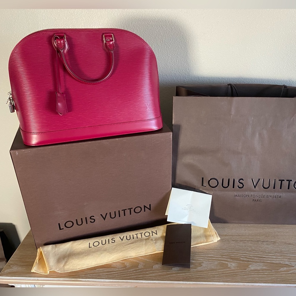 Louis Vuitton Alma PM Epi Leather Satchel in Raspberry